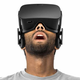 A bearded man goes slack-jawed with awe as he uses the Oculus Rift. (Photo: Oculus)